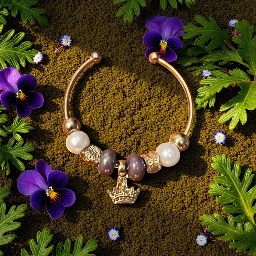 Elegant Gold&  Pearl Charm Bracelet w Iridescent, purple beads, and crown charm.